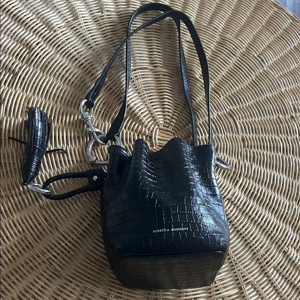 Rebecca Minkoff Black Croc Mini Bucket Bag with Tassel.
Hight 7”
Wide 7”